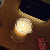 Dame Melt Together, green tea, fig, and cedar massage candle